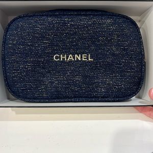 Blue and gold Chanel makeup bag